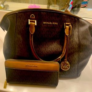 Leather Michael Kore purse and wallet.